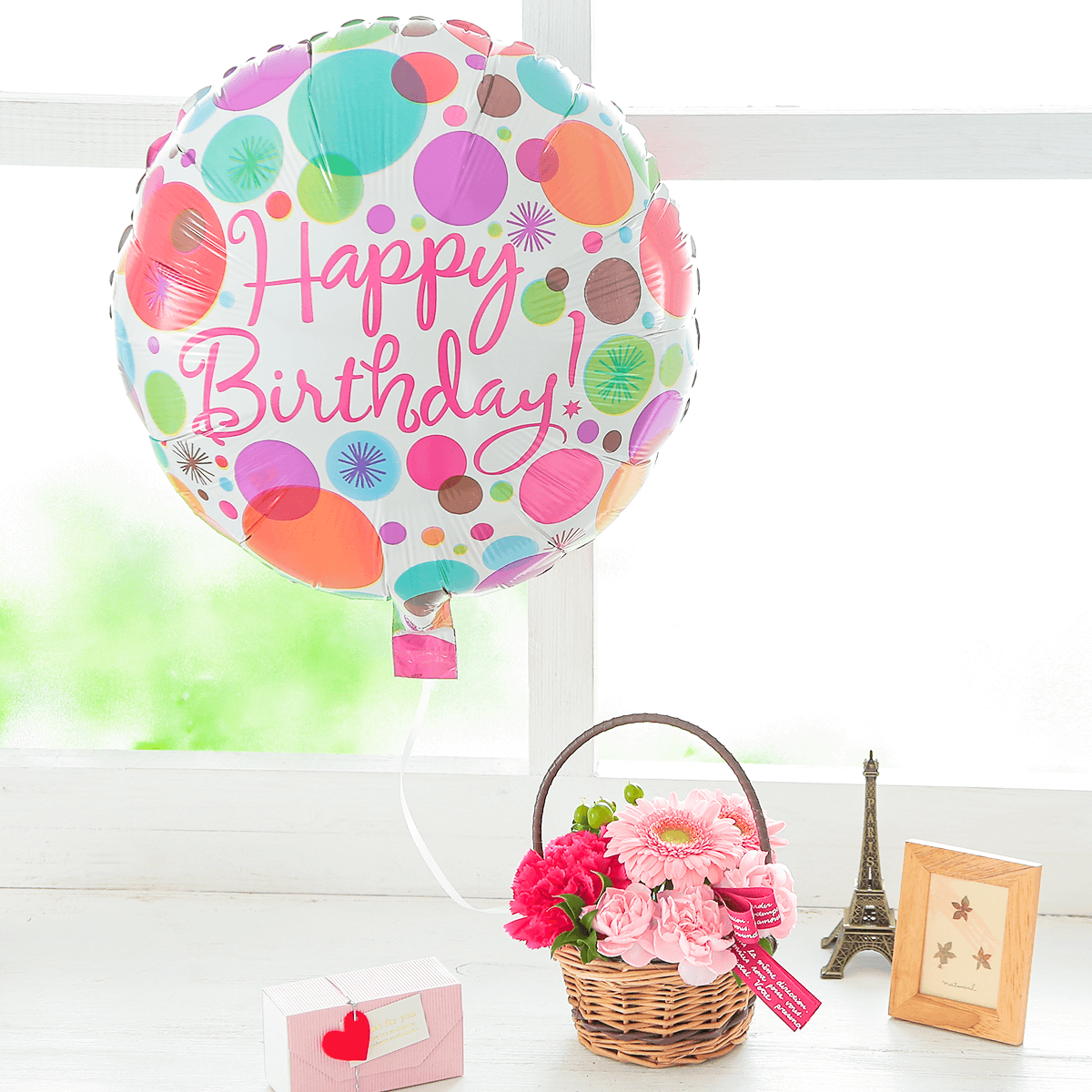 誕生日用バルーンとピンク色のお花のセット